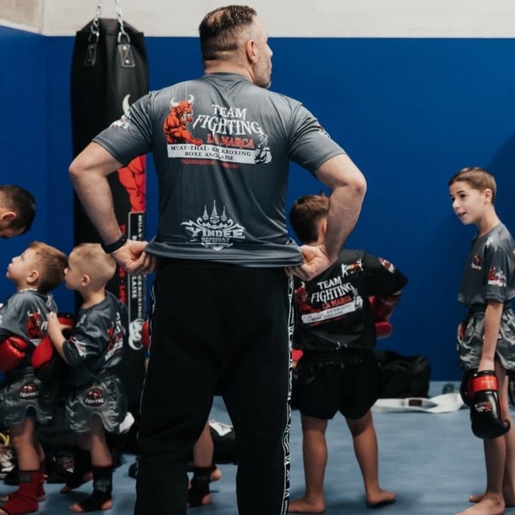 Photo à remplacer - coach et débutant Team Fighting La Marca à Trazegnies